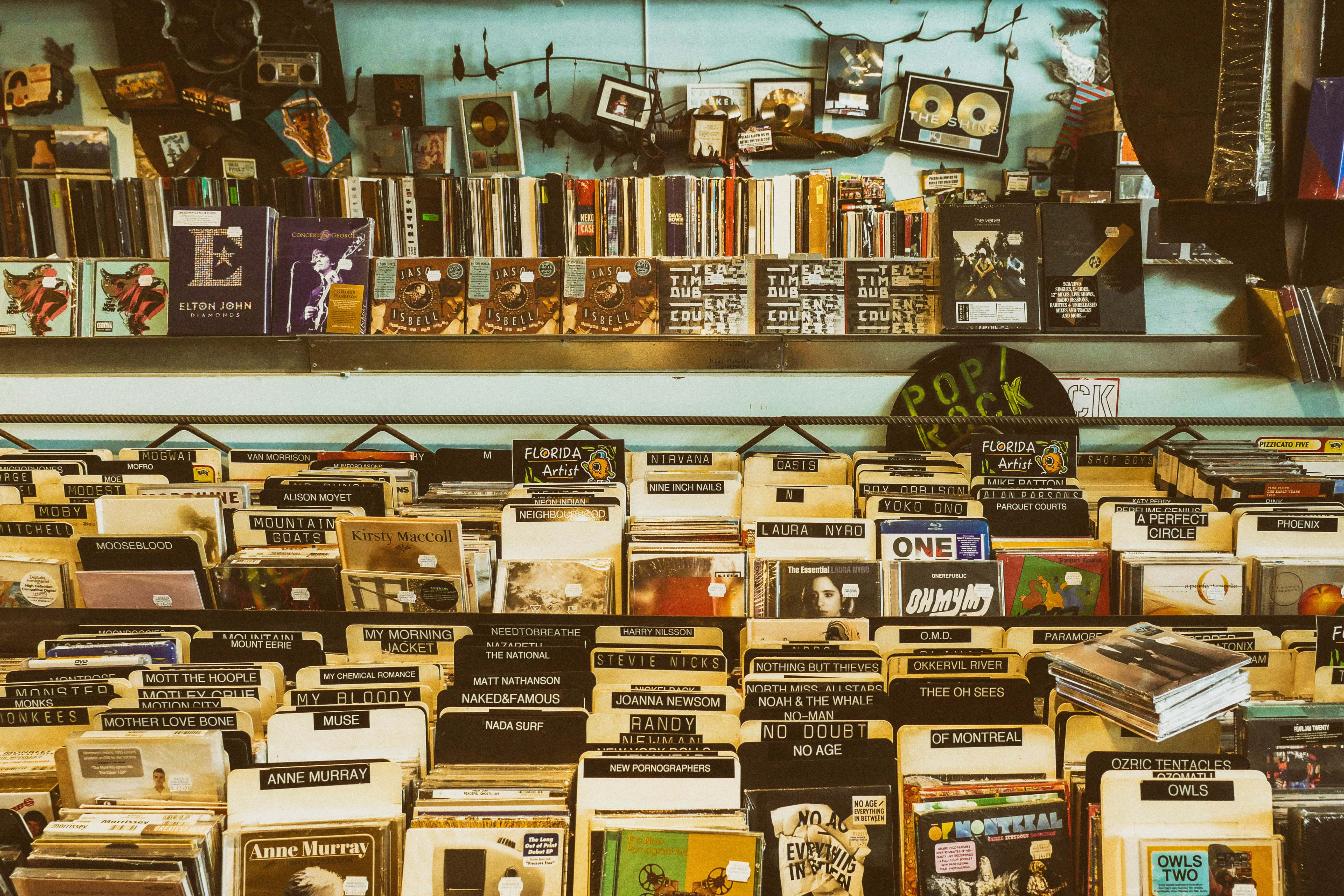 a photo of various different albums arranged by artist for sale