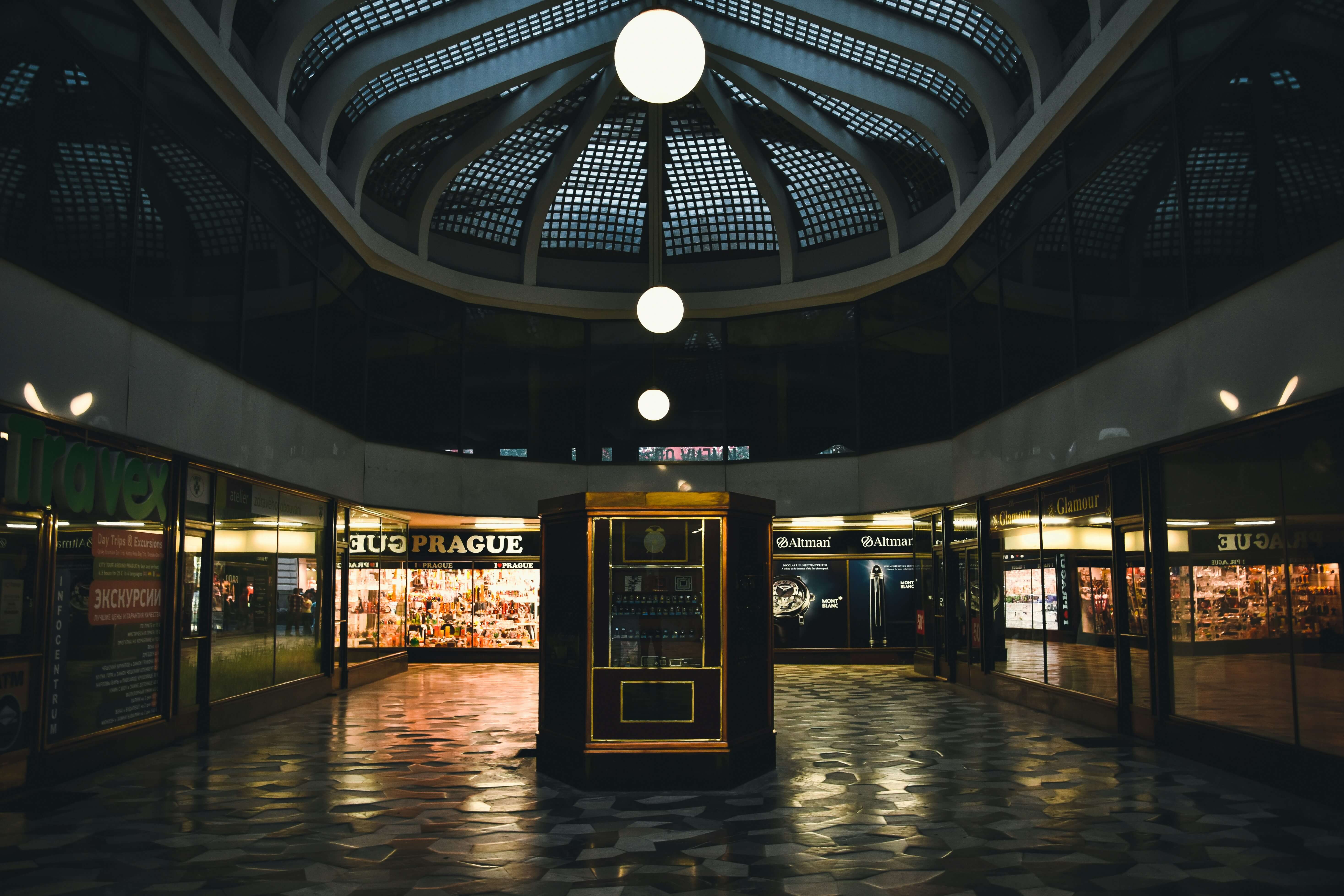 a photo of a empty modern mall with dark colors