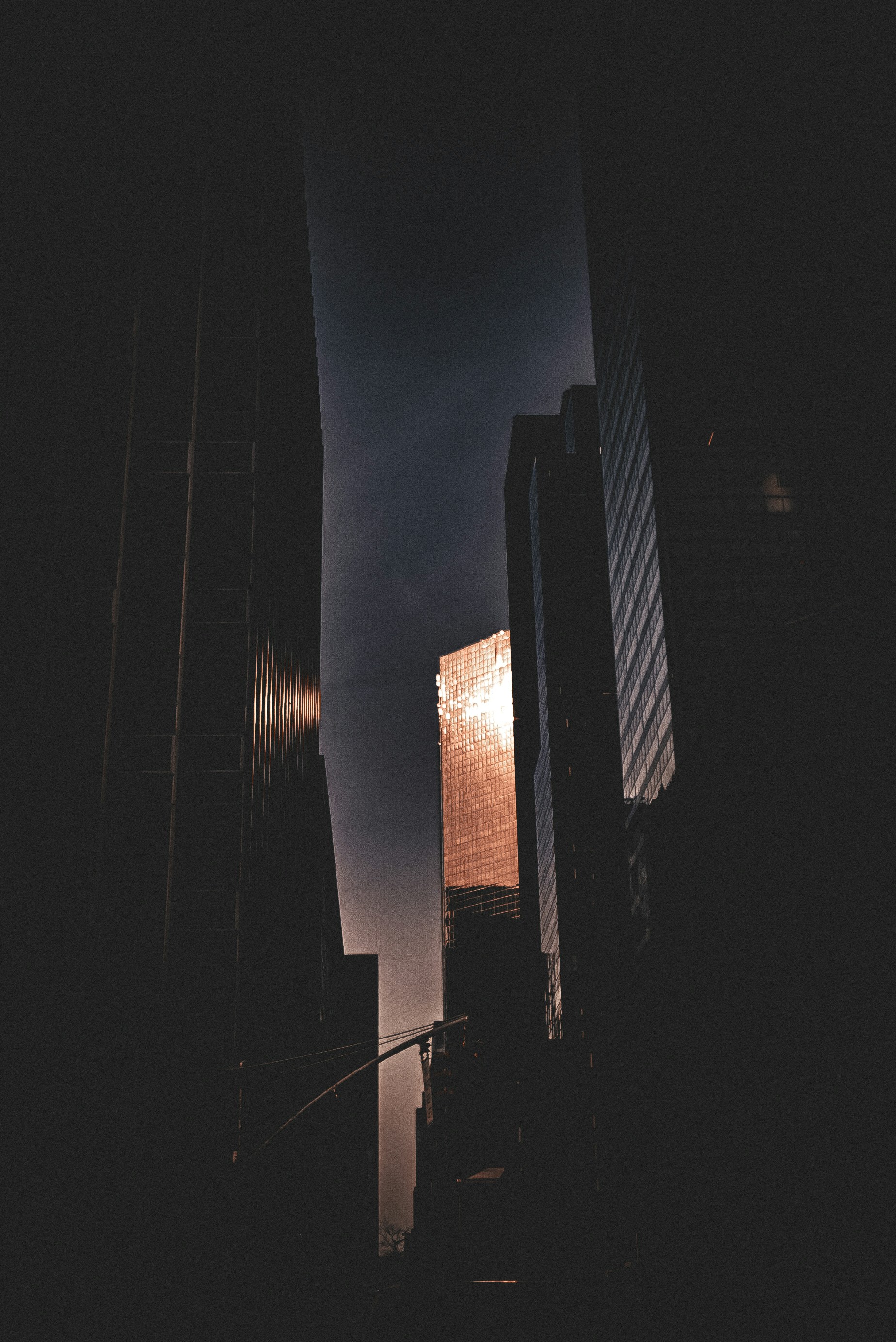a photo of a dark slightly luminated city