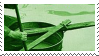 A green tinted image of a tin barrel and wood being used as a boat